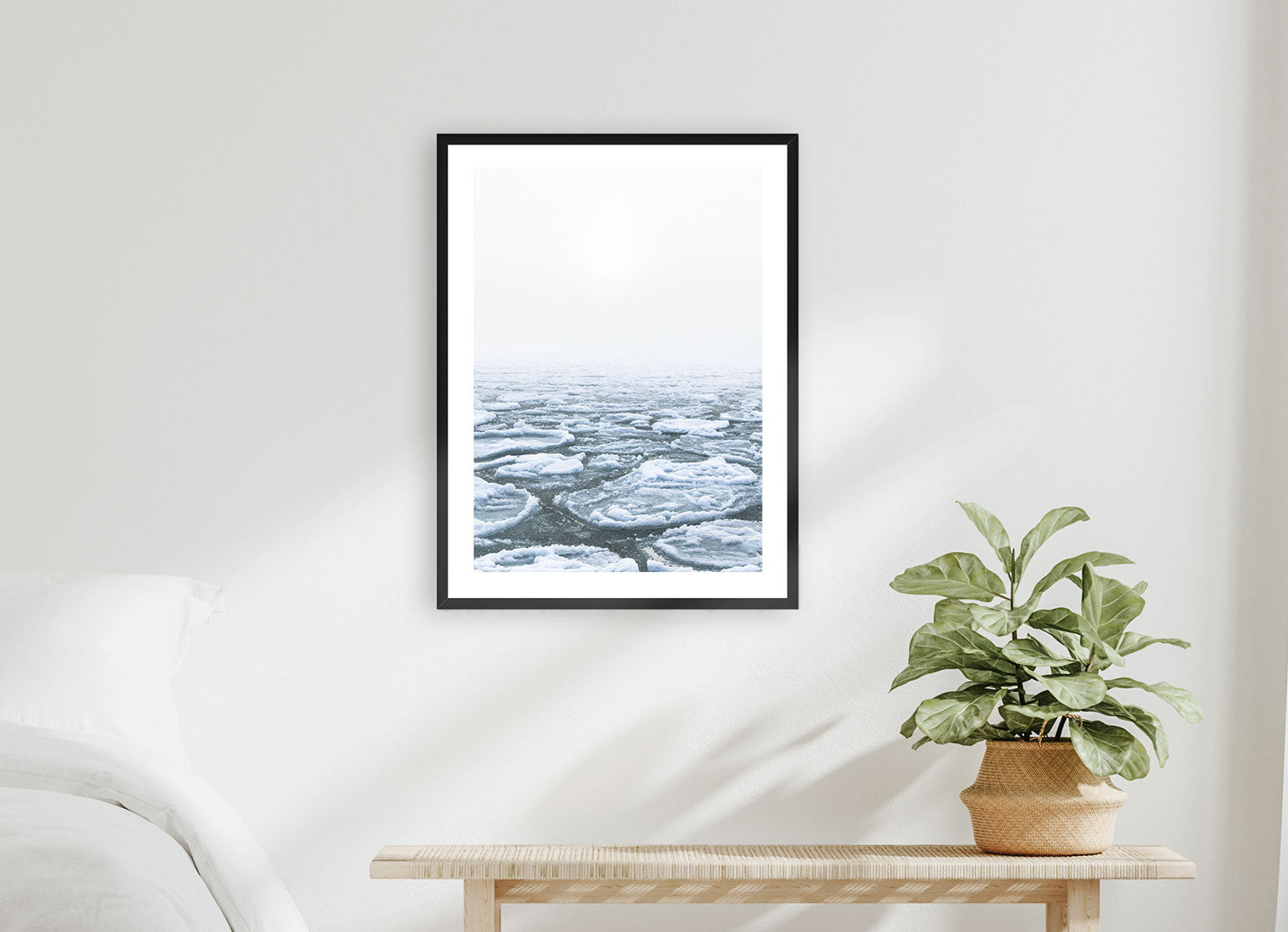 A framed print of ice pans in fog