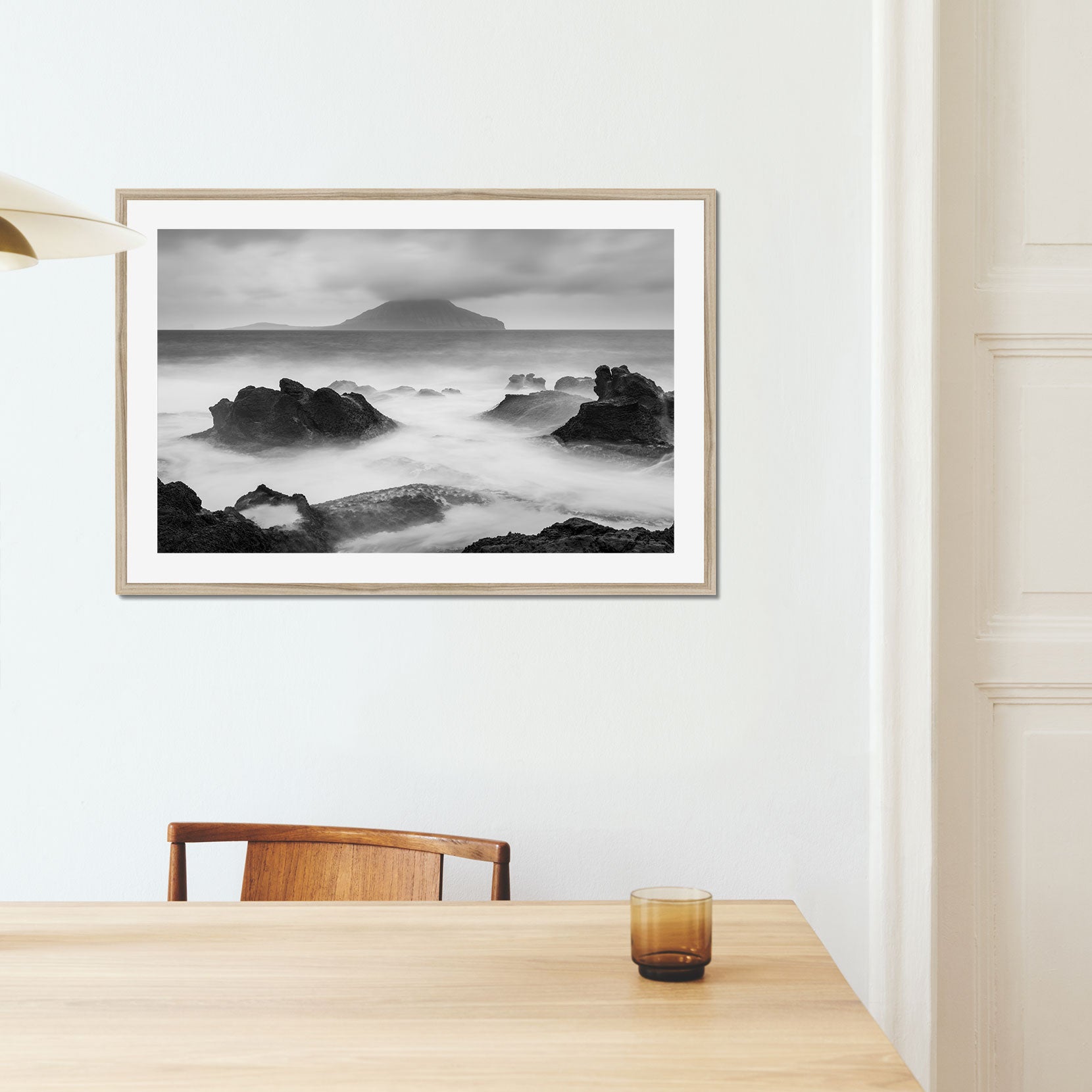 A framed print of a rugged shoreline on the Faroe Islands