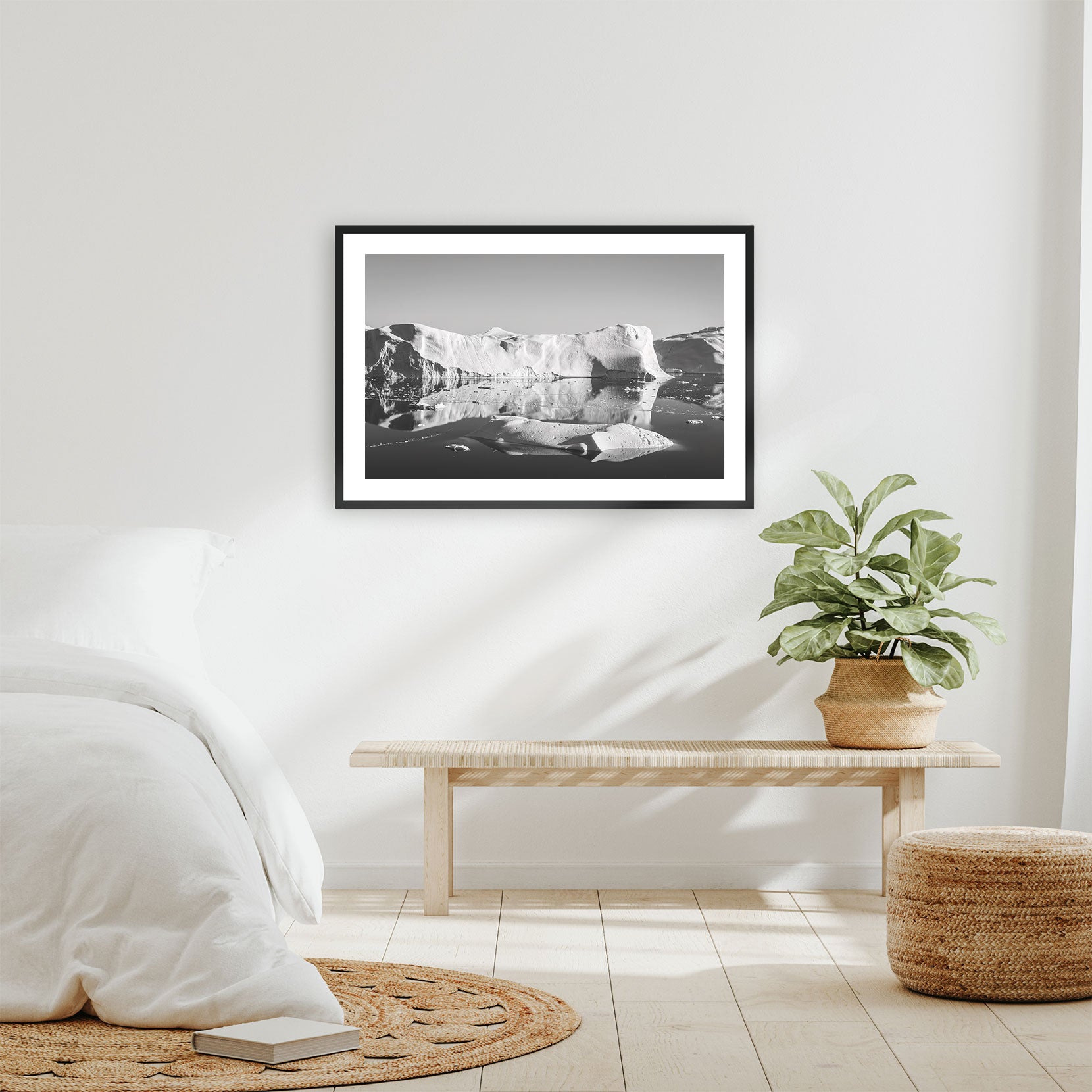 A framed black and white print of icebergs in Greenland