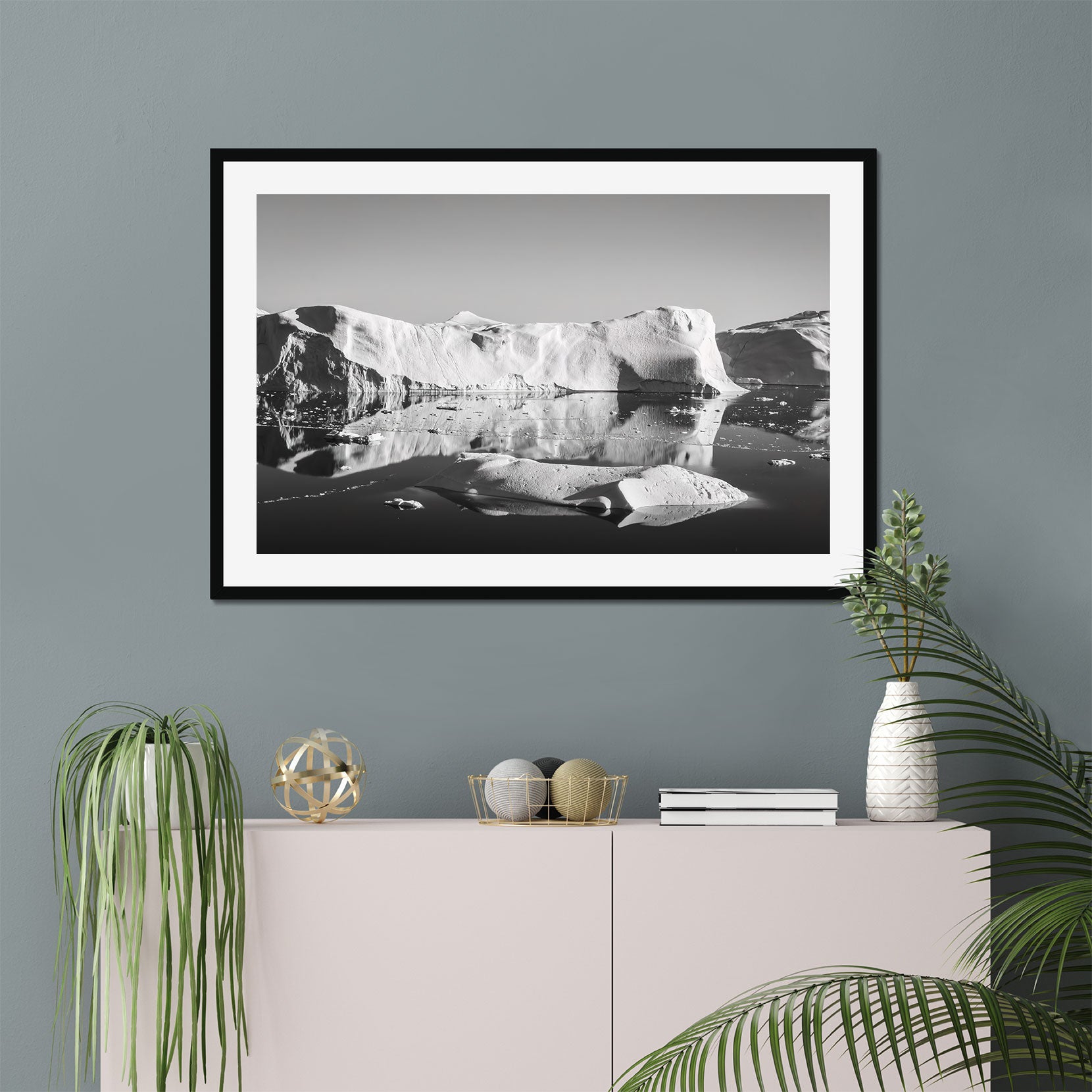 A framed black and white print of icebergs in Greenland