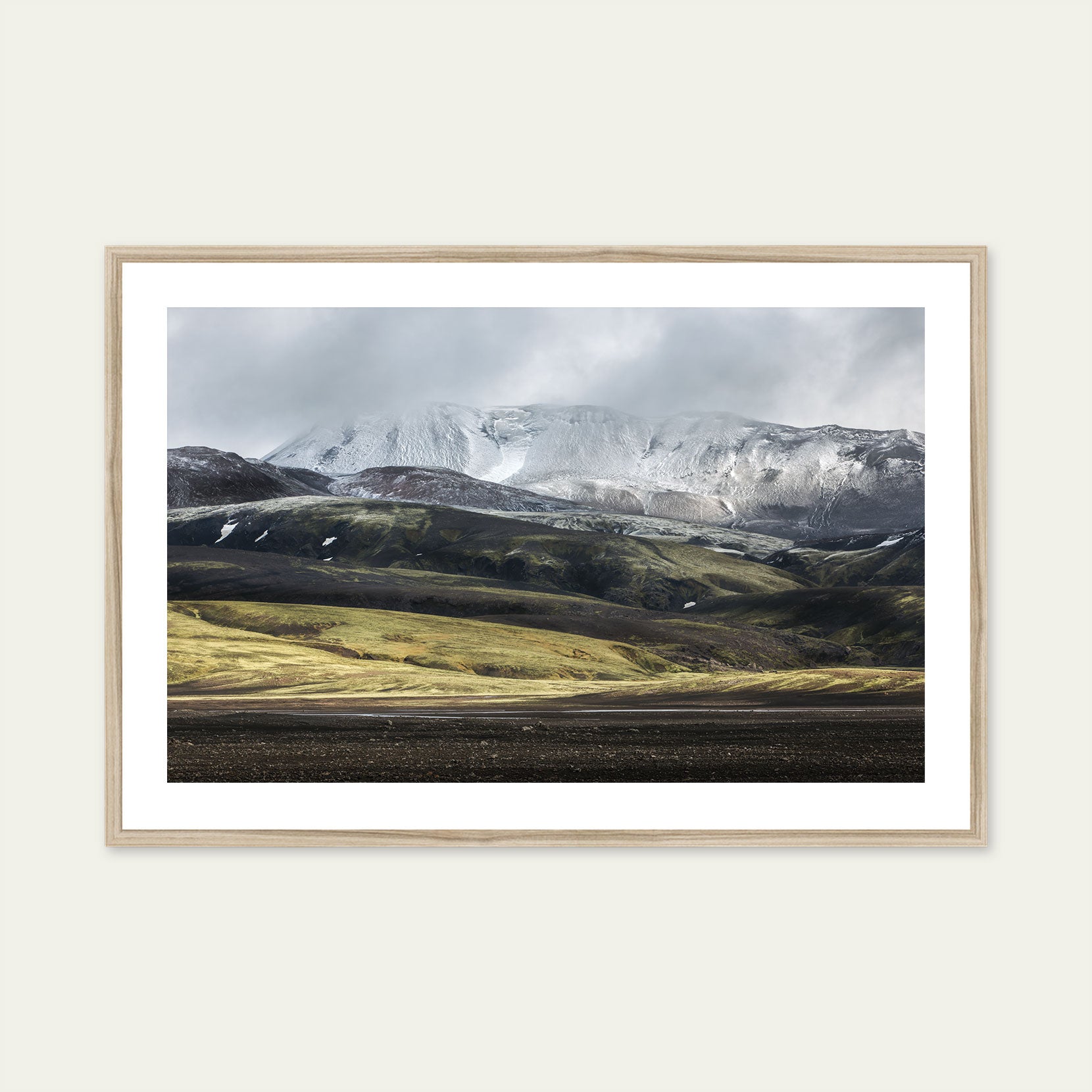 A wood framed print of a mountain range in Iceland