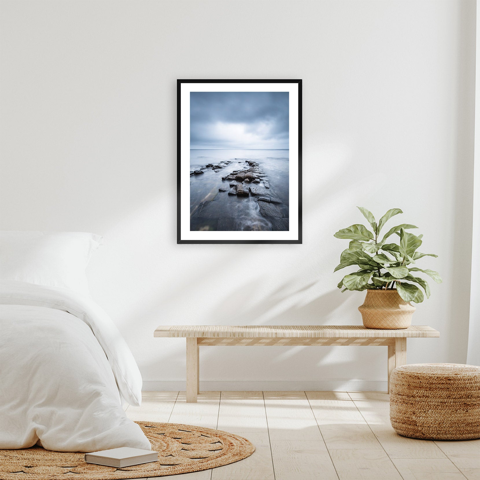 A framed print of a moody seascape in Norway